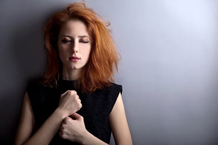 woman feeling insecure and trapped by jealousy in a relationship