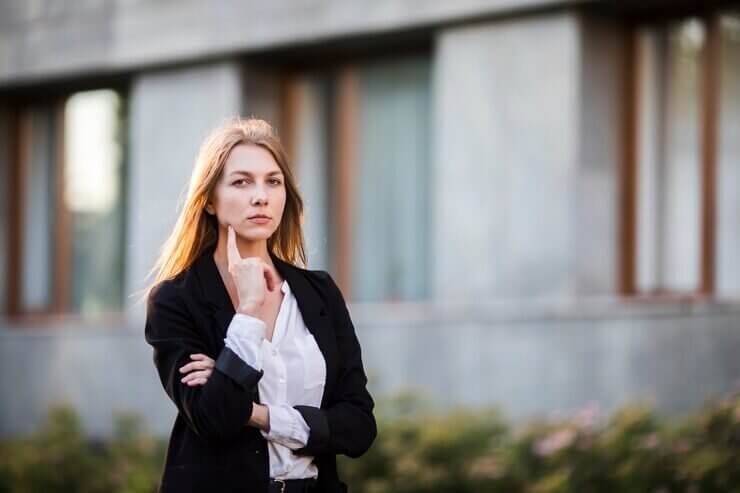 successful woman feeling emotionally exhausted and insecure in a relationship, highlighting insecurity in relationships